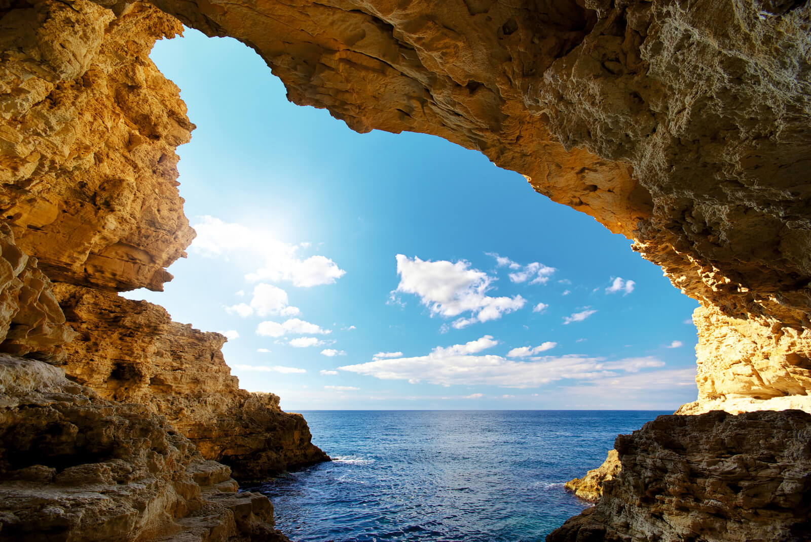 039-tapete-vlies-grotte-sonnenschein-meer